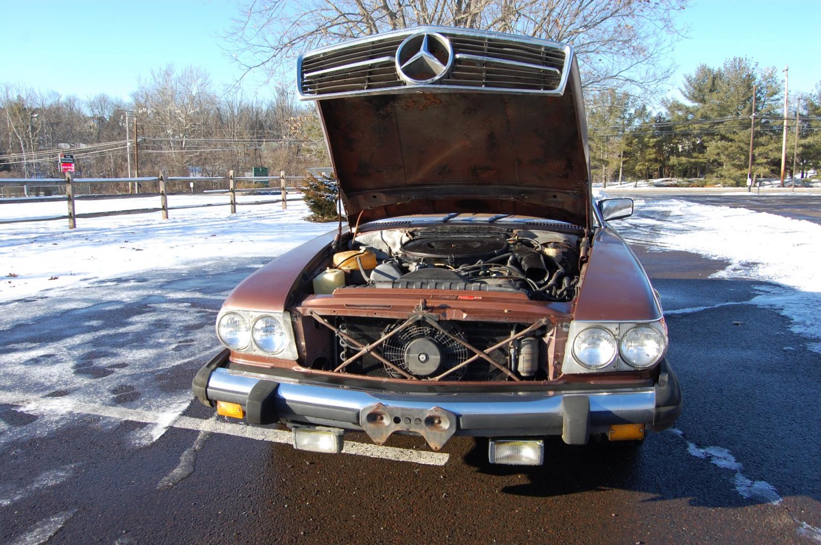 1976 Brown /Brown Leather Mercedes-Benz 450SL (10704412030) with an 4.5L V8 engine, Automatic transmission, located at 6528 Lower York Road, New Hope, PA, 18938, (215) 862-9555, 40.358707, -74.977882 - Here we have a nice 1976 Mercedes 450SL convertible with a 4.5L V8 engine putting power to the rear wheels via an automatic transmission. Some options on this vehicle include brown leather, wood trim, power windows, removable hard top, heat, A/C, AM/FM radio, cruise control, wood steering wheel, 14 - Photo#21